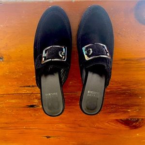 Stuart Weizmann black suede clogs.